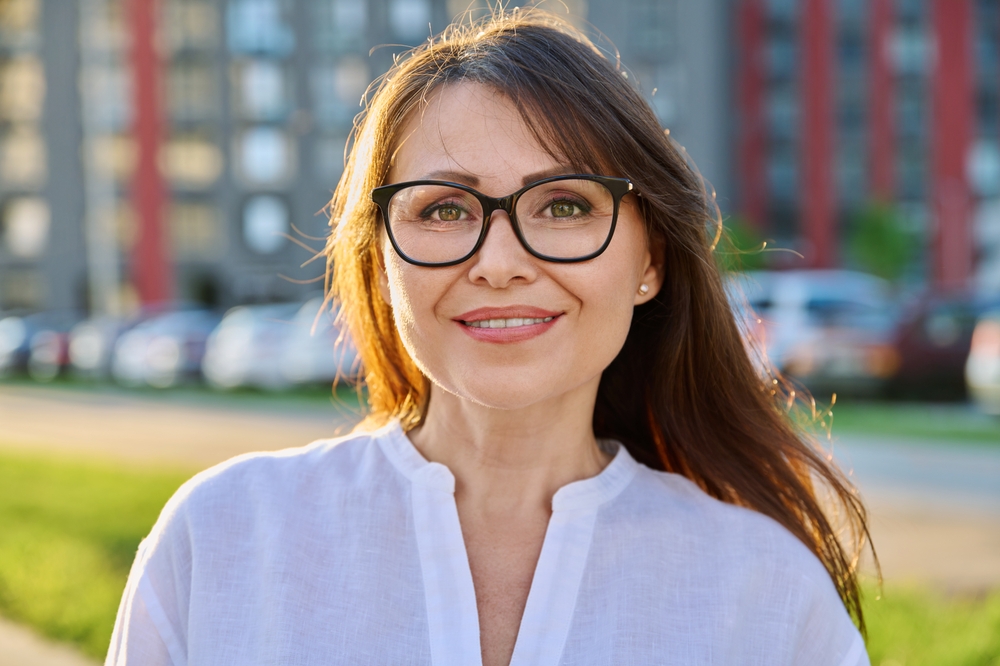 Portrait,Beautiful,Positive,Mature,Woman,In,Glasses,,Outdoor
